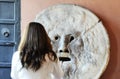 Beautiful asian women photograph each other in front of the mouth of truth Bocca della VeritÃÂ . Church of Santa Maria in Royalty Free Stock Photo